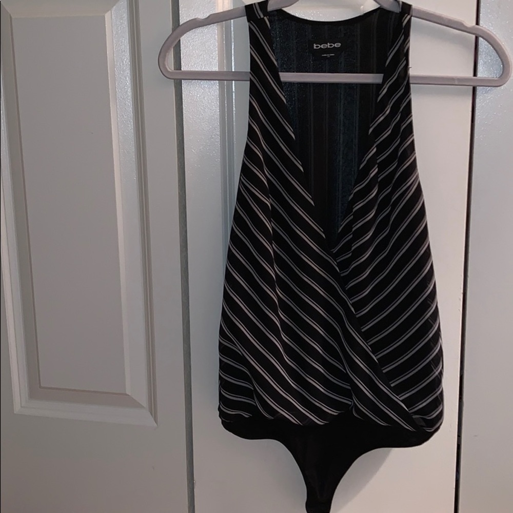 Bebe low cut from striped body suit.